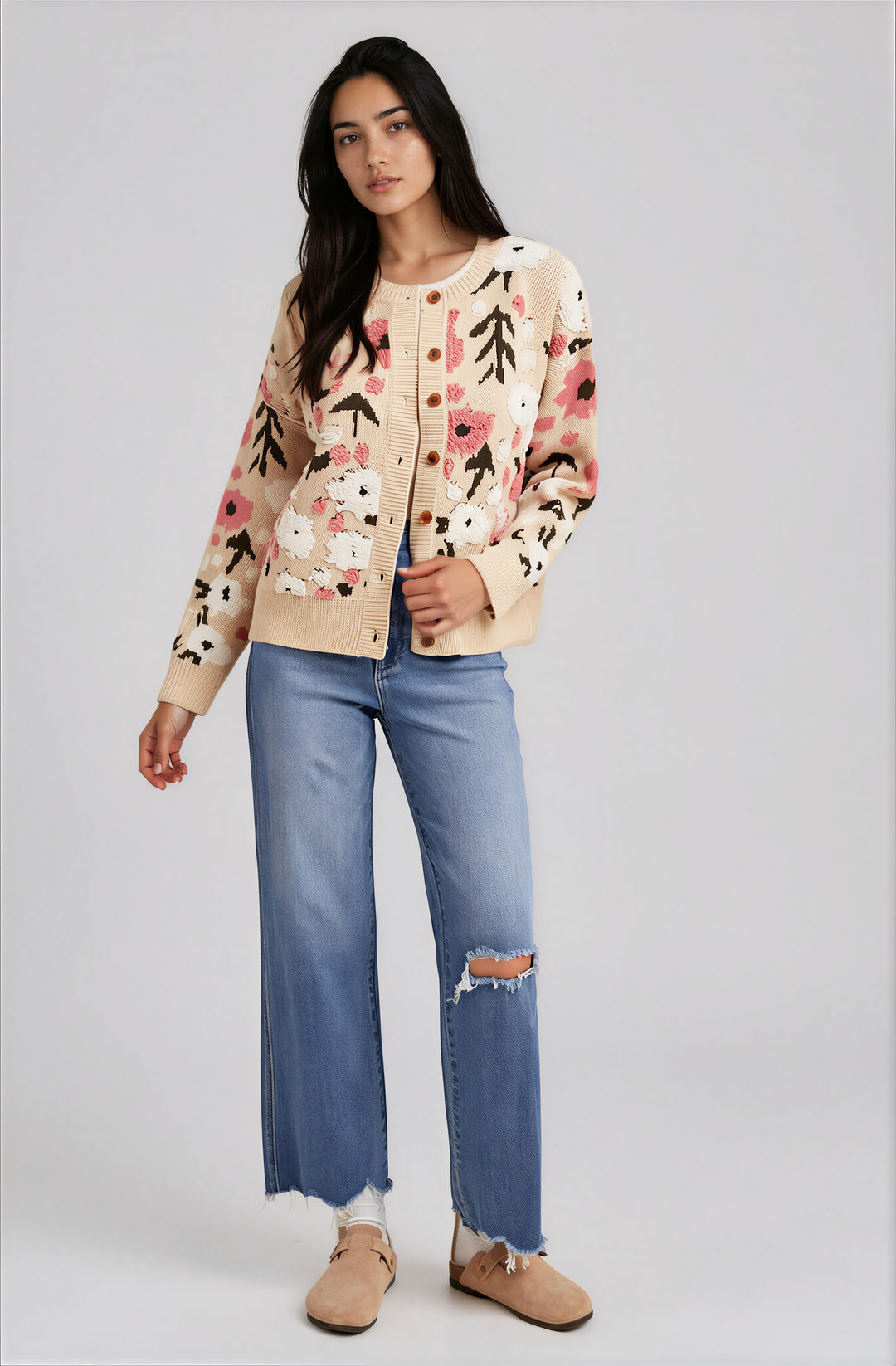 Front view beige floral knit cardigan on model