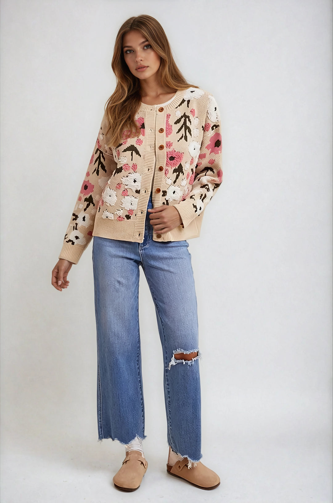 Front view beige floral knit cardigan on model