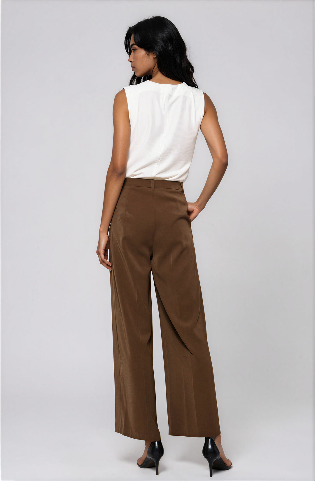 Back view ivory sleeveless blouse with clean refined silhouette